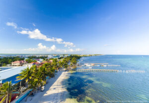 Belize Travel guide featuring beautiful Caribbean beaches, clear blue water, and tropical scenery
